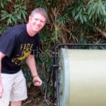 Mr. Compost turning his composter.