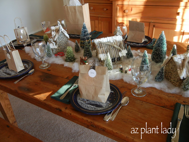 Wonderful Christmas, My mother's beautifully decorated table.  Notice the table gifts are decorated with a feather from the chickens