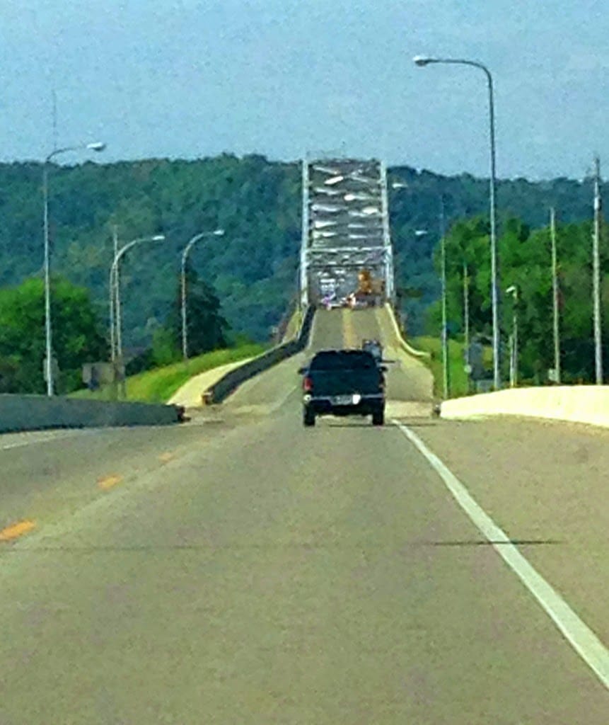 Bridge over the Mississippi River toward Minnesota. *Cell phone + dirty windshield = grainy photo