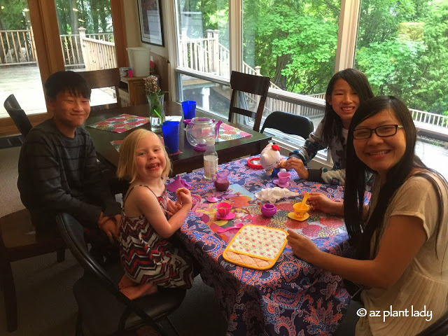 Enjoying a tea party.