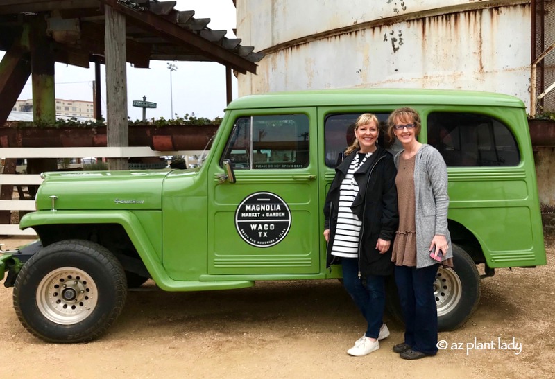 Photo of the green waco truck with sisters