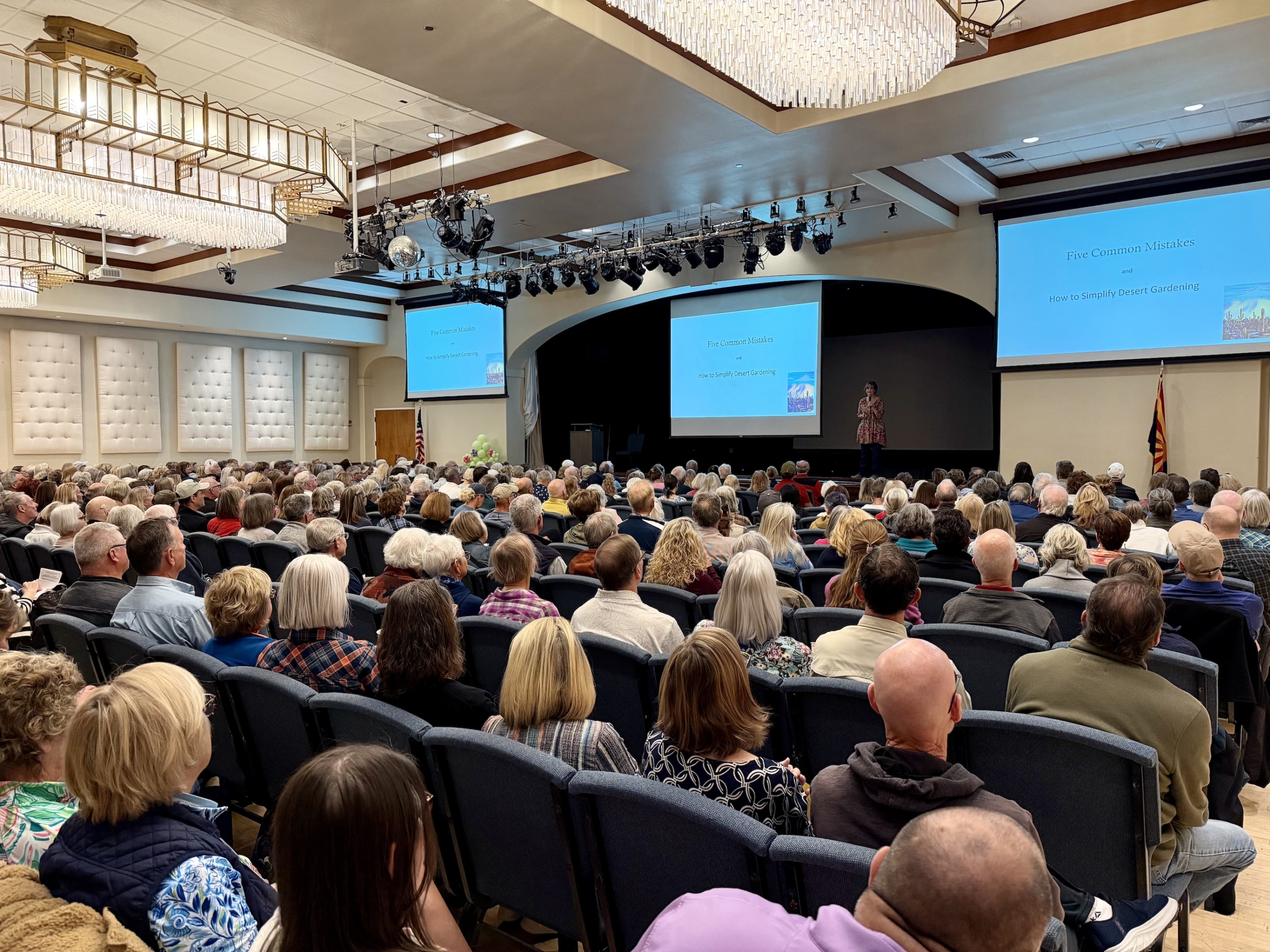 Noelle_Johnson_AZ_Plant_Lady_Speaker_Horticulturist_Author 2 copy Noelle Johnson, AZ Plant Lady on stage in large auditorium talking about how to garden in the desert